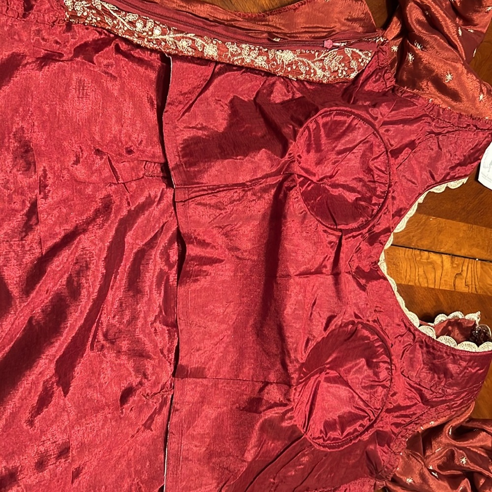 Elegant rust color lehenga with long top with crystal work - Picture 7 of 15